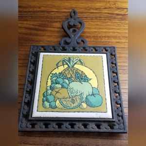 Holt Howard vintage cast iron trivit with fruit design tile